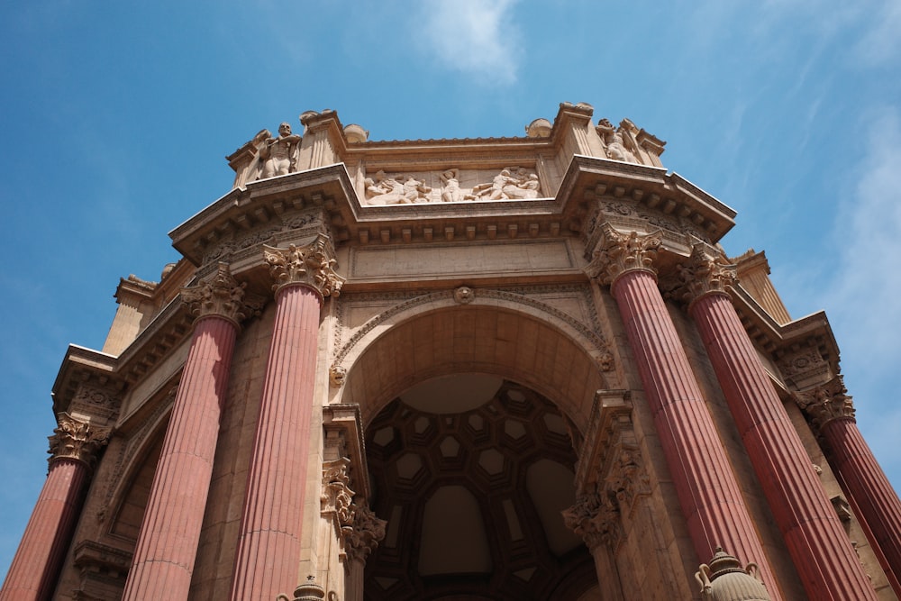 a building with pillars and statues