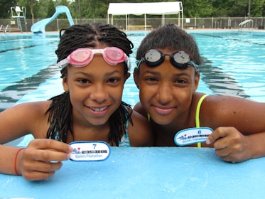 a man and a woman in a pool