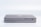 Two sleek, modern laptops are placed on top of each other, highlighting the slim design and metallic finish. Various ports are visible on the side, emphasizing the functionality and technology.
