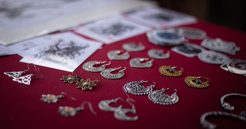 a red table with jewelry