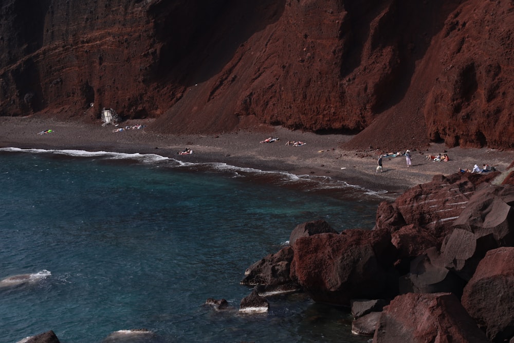 a group of people on a beach