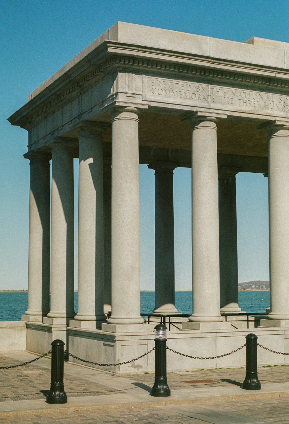 a large stone structure with columns