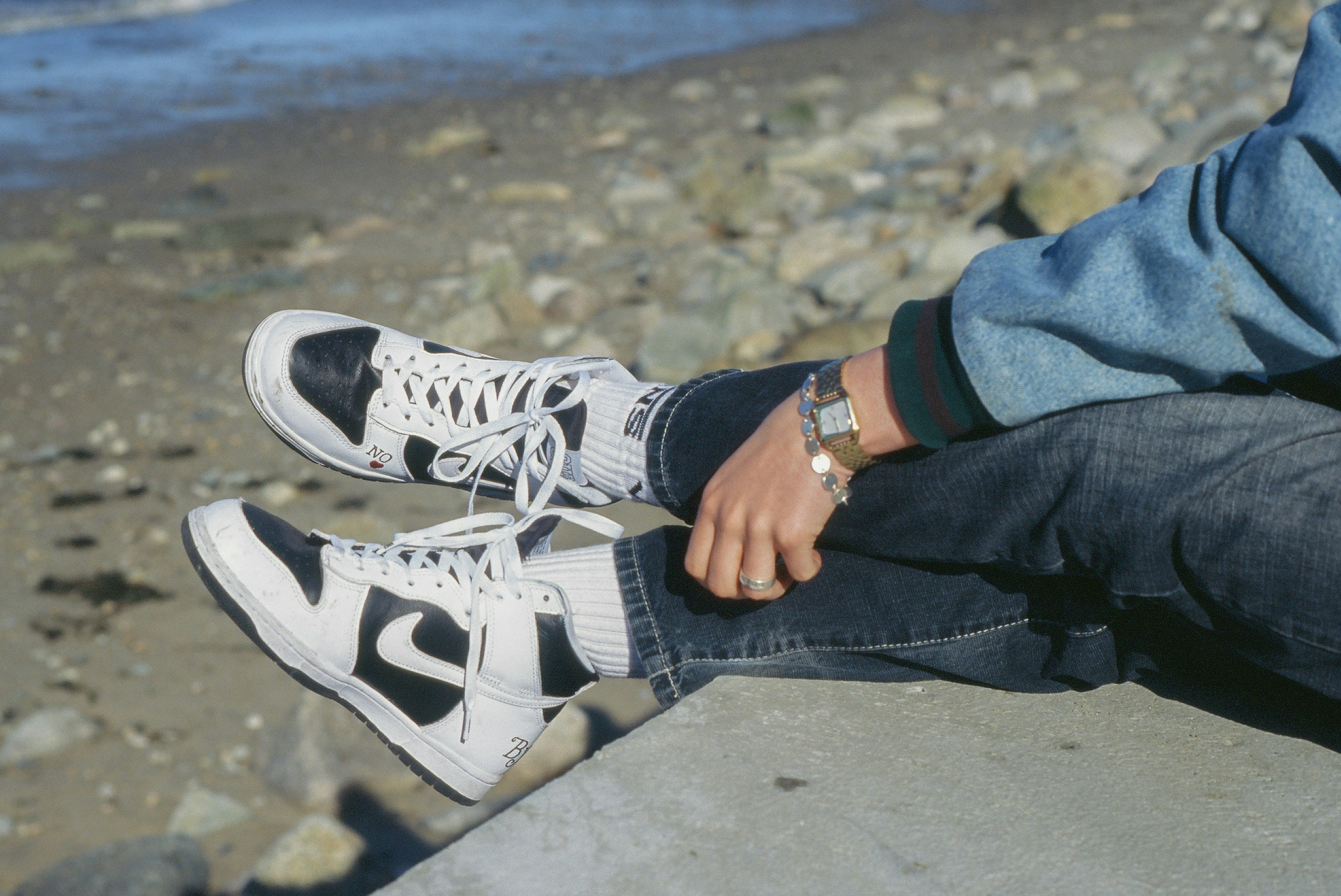 a person's feet on a beach