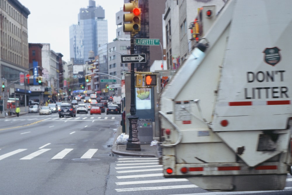 a truck is stopped at a traffic light