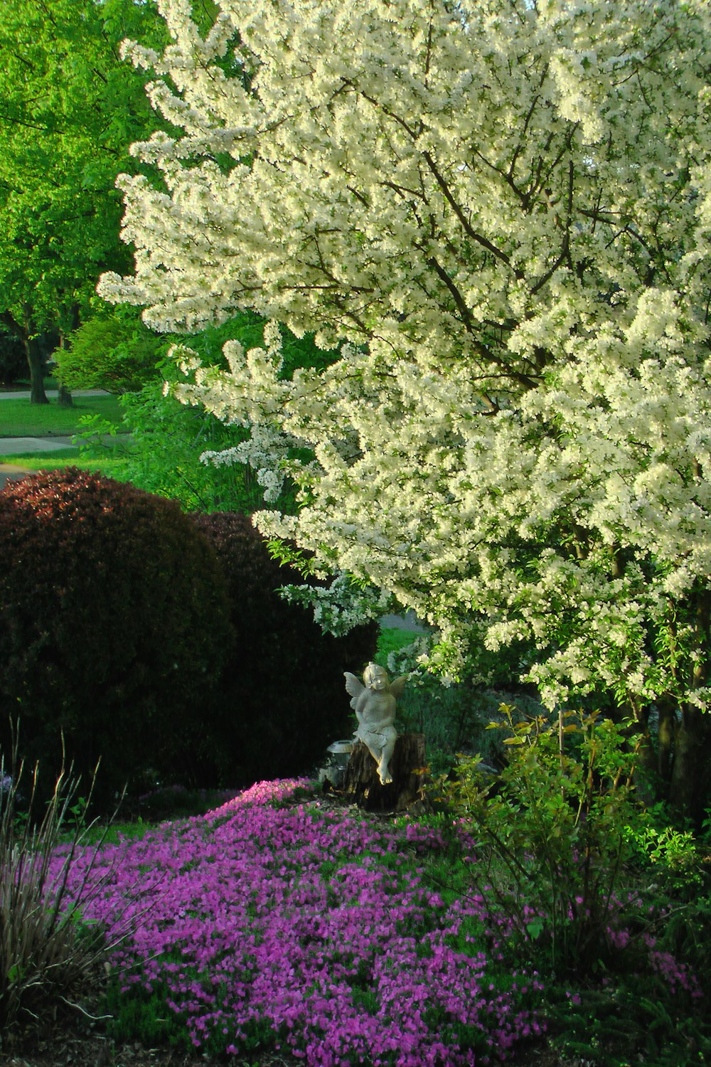 a statue in a garden