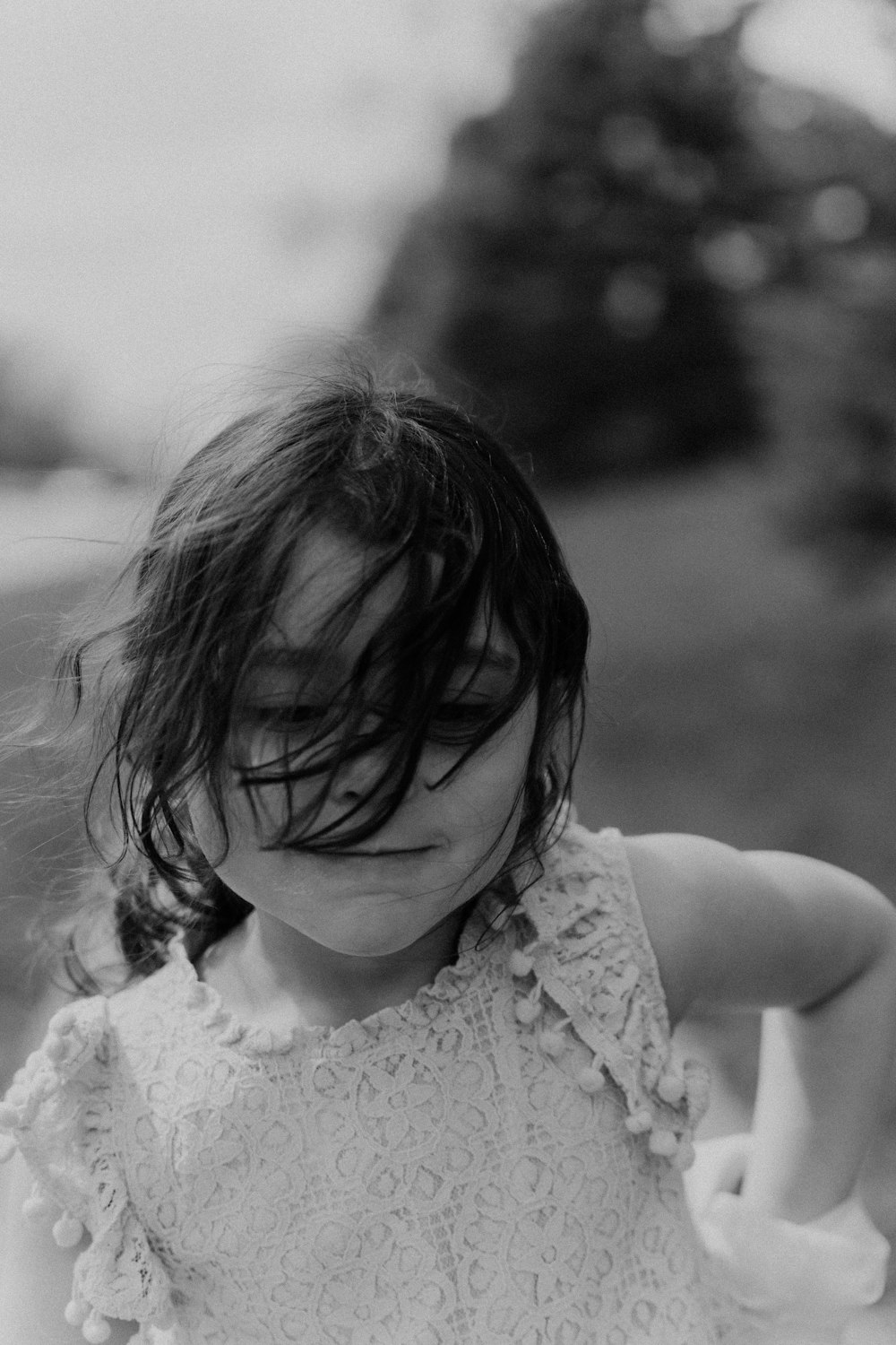 a little girl with a white dress