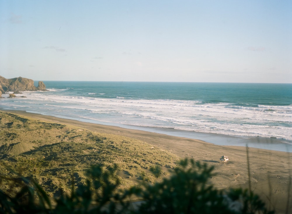 a beach with waves crashing