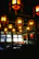 Cozy interior of Gingembre Doré with softly lit tables and elegant Asian decor.