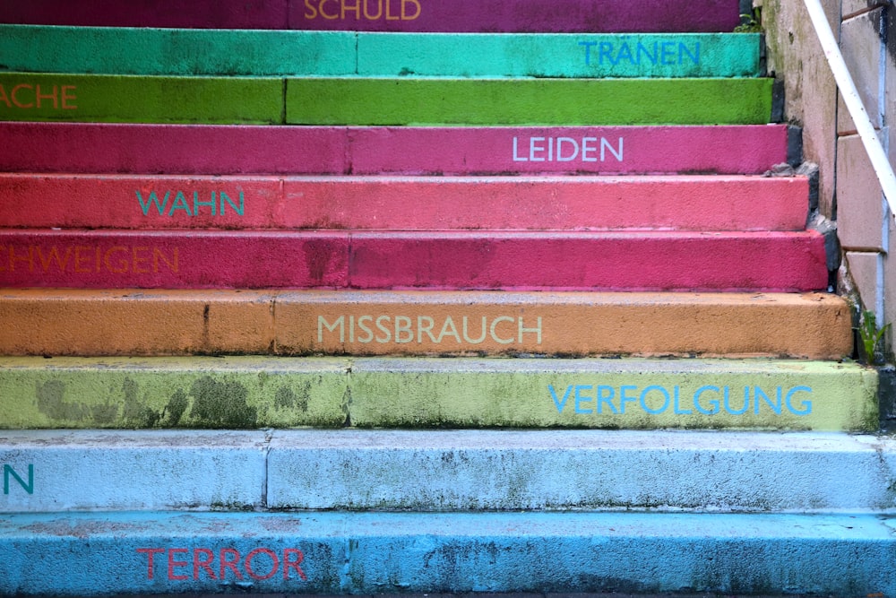 a set of stairs with writing on them