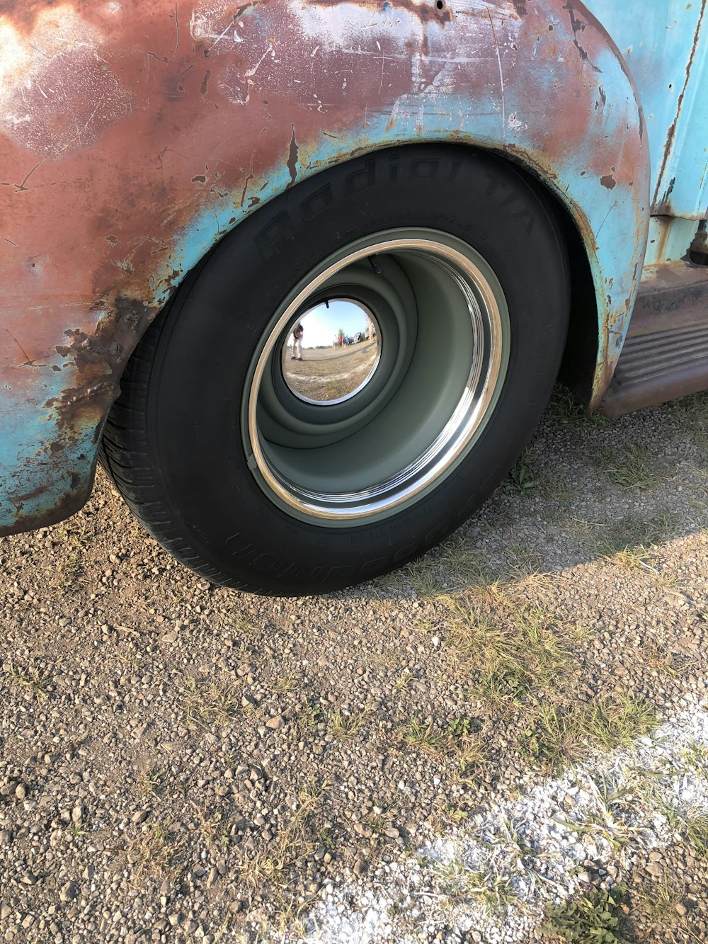 a tire on a red car