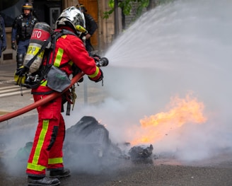 a firefighter putting out a fire