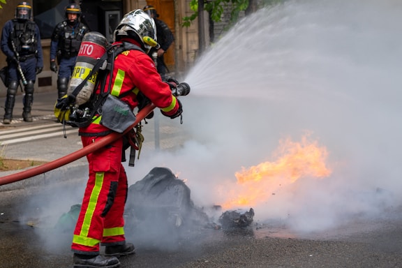 a firefighter putting out a fire