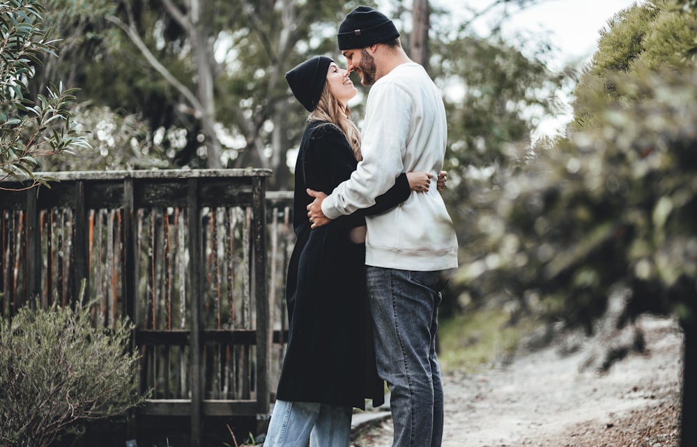 a man and woman kissing