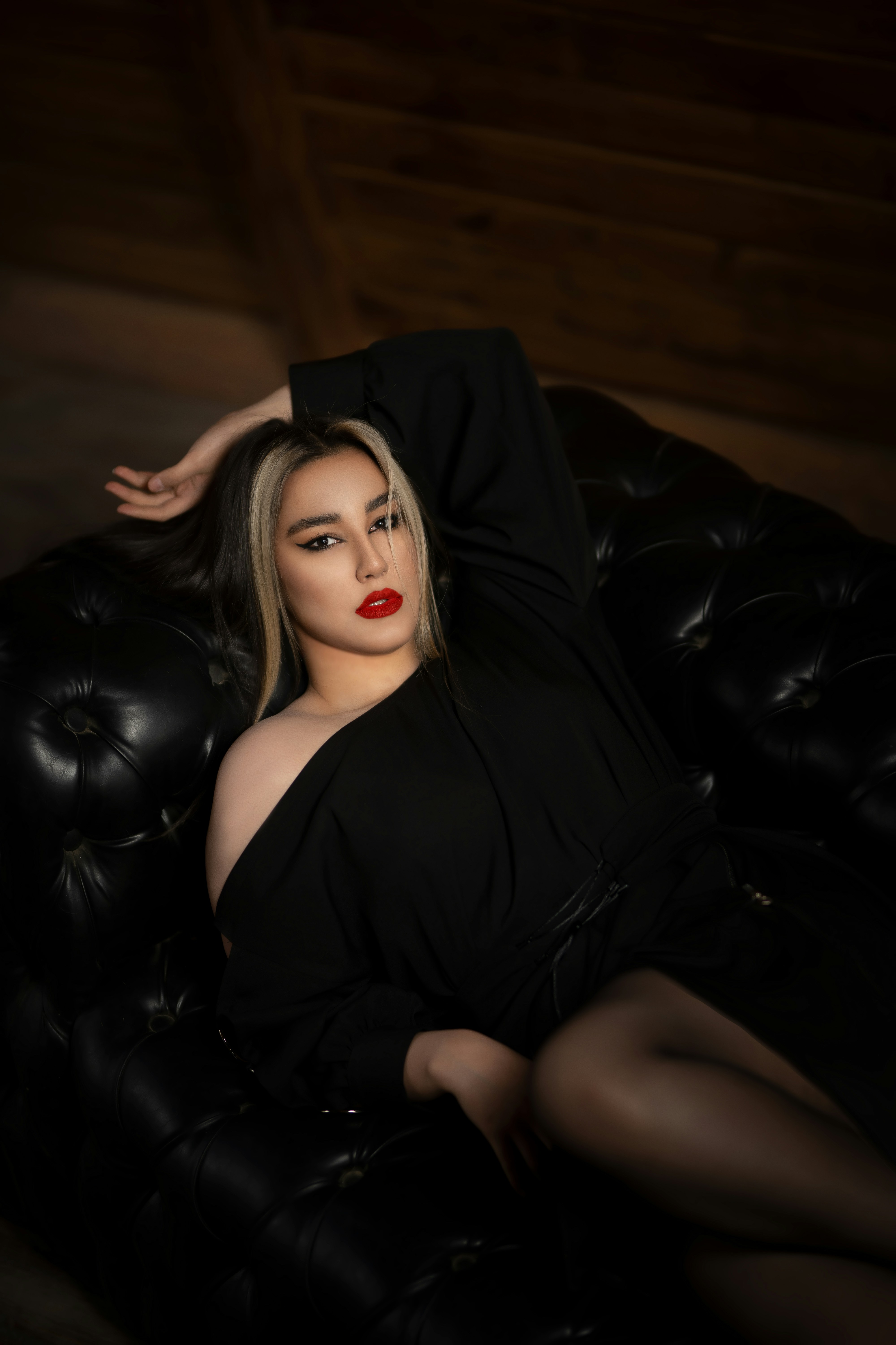 a woman sitting on a couch