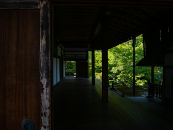 Interior of the garden villa featuring warm lighting and tasteful, rustic Greek furnishings.