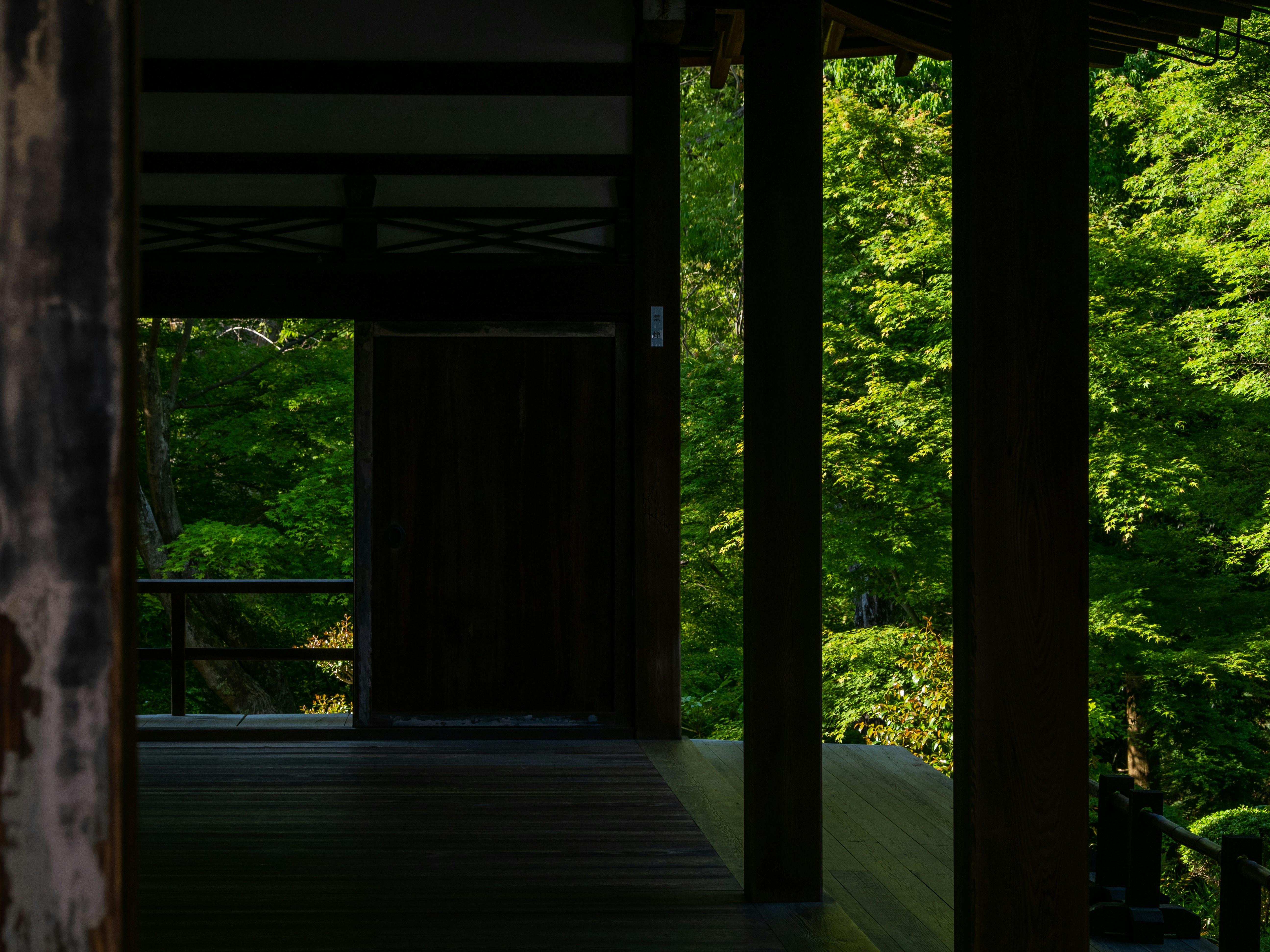 a wooden porch with trees
