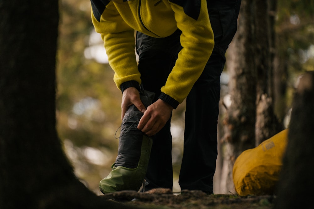 a person in a yellow raincoat