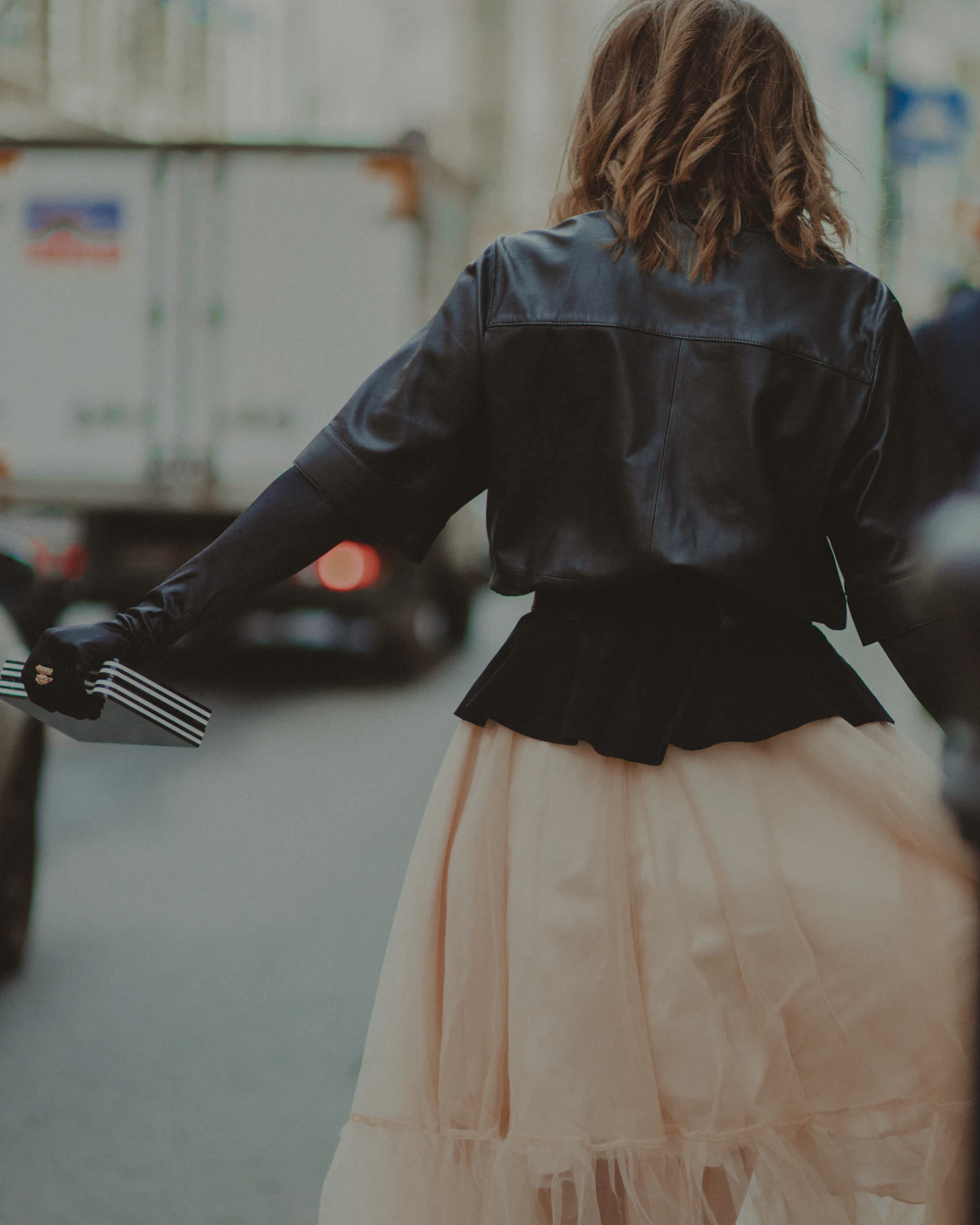 A woman in an elegant maxi skirt, editorial mood