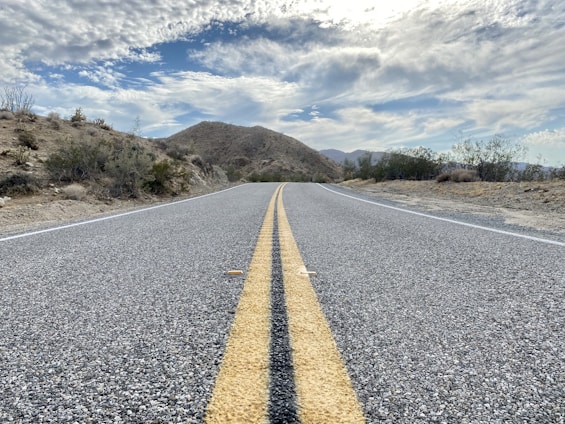a road with yellow lines