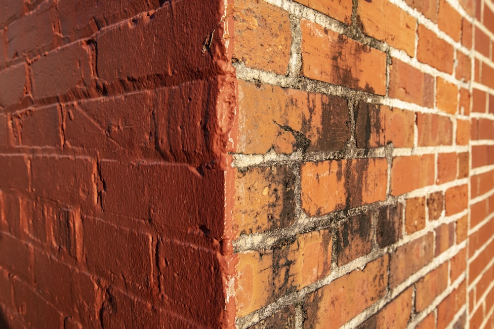 a brick wall with a hole in it