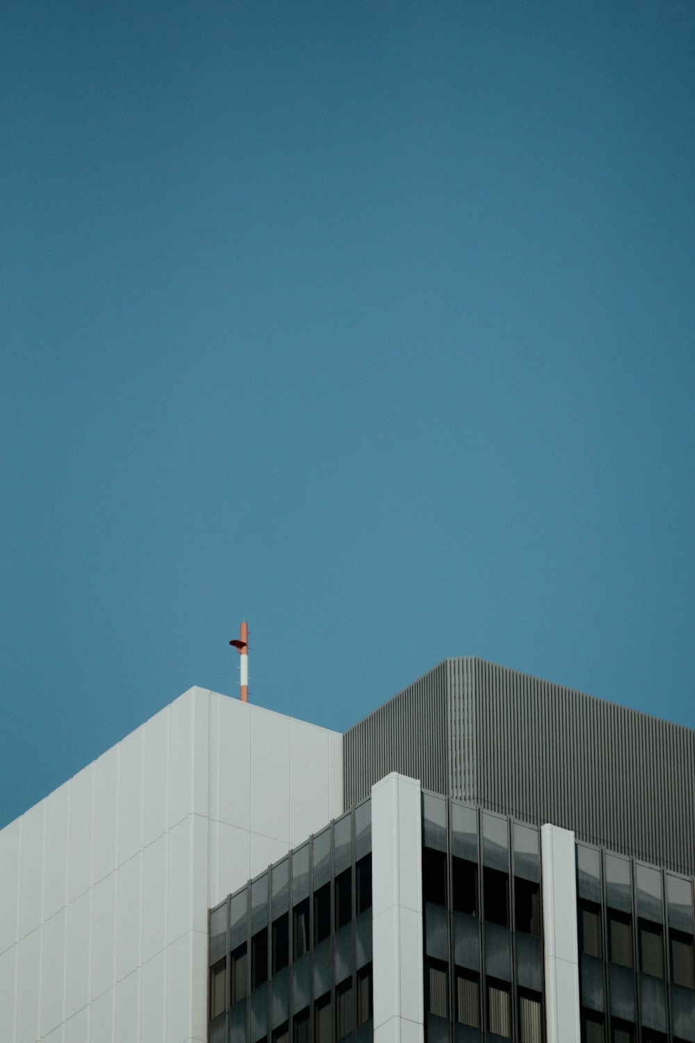 a few buildings with a blue sky