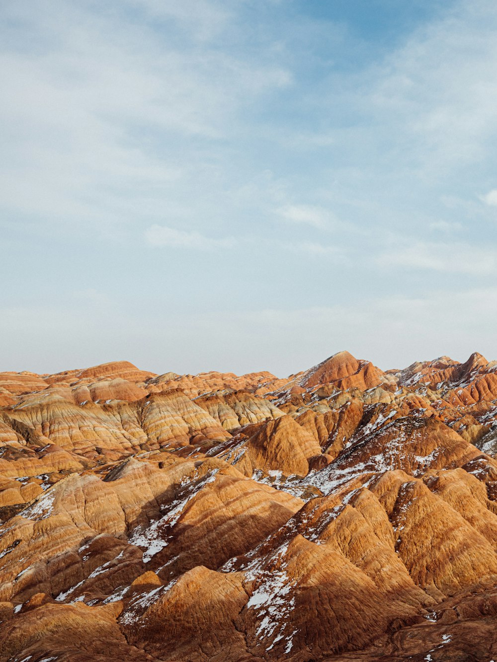 a rocky landscape with a blue sky