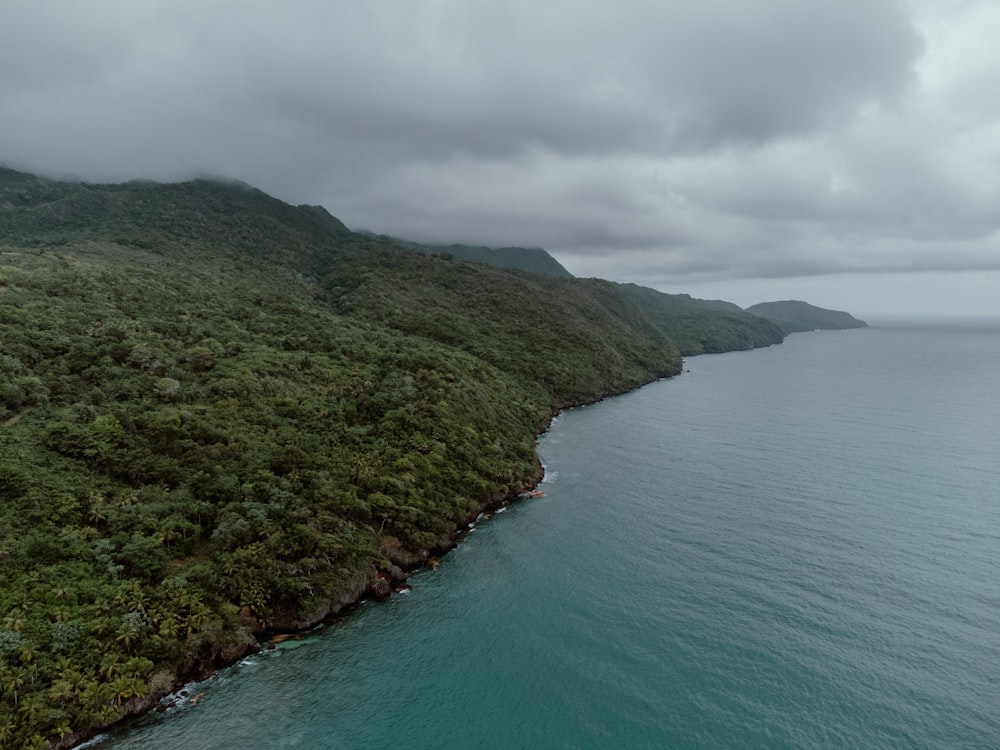 a body of water with hills around it