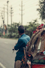 a person carrying a bunch of colorful objects on the back