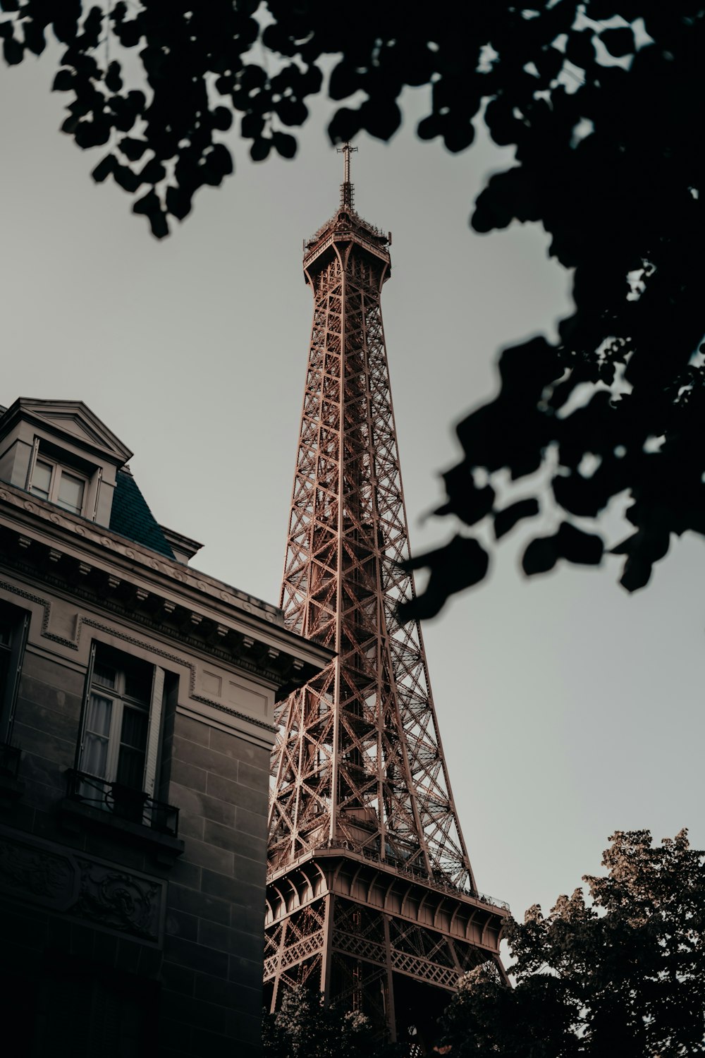 a large tall tower with a clock at the top of a building