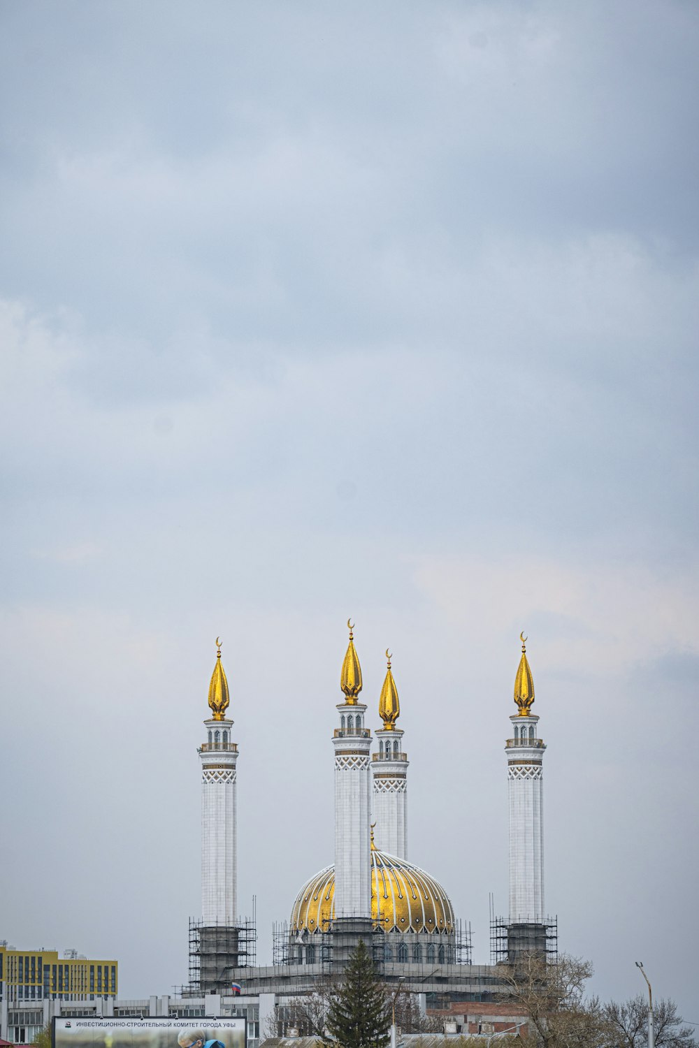 a large building with gold domes