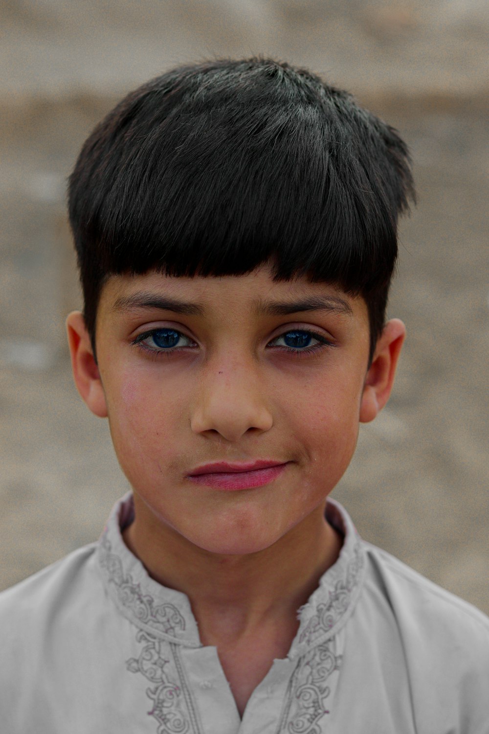 a boy with blue eyes