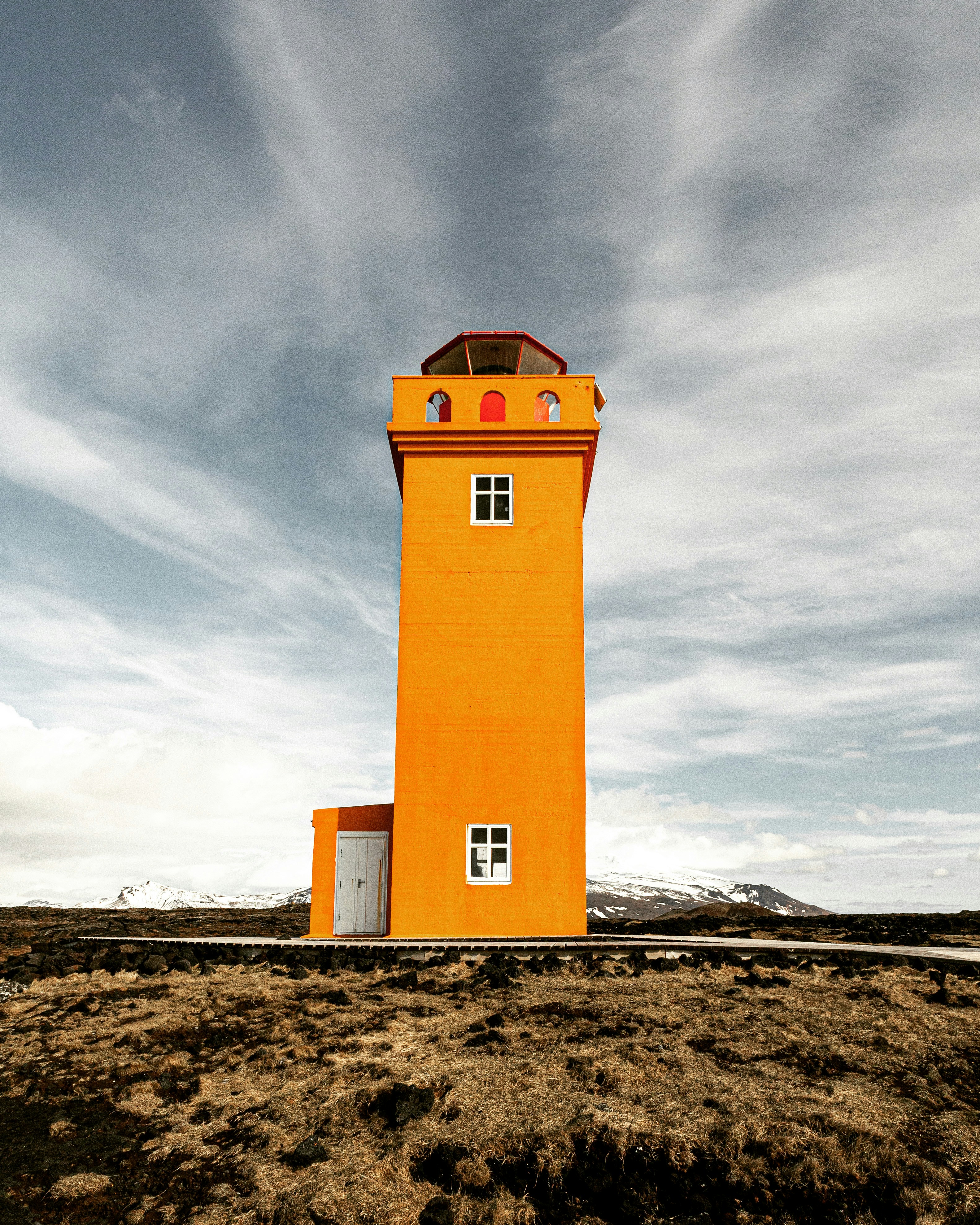 a lighthouse on a beach