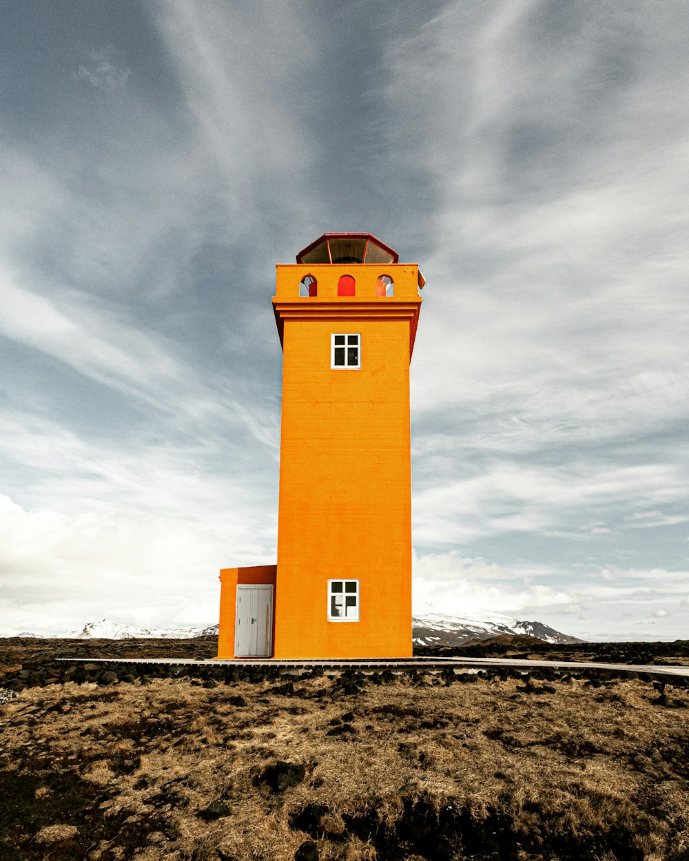 a lighthouse on a beach