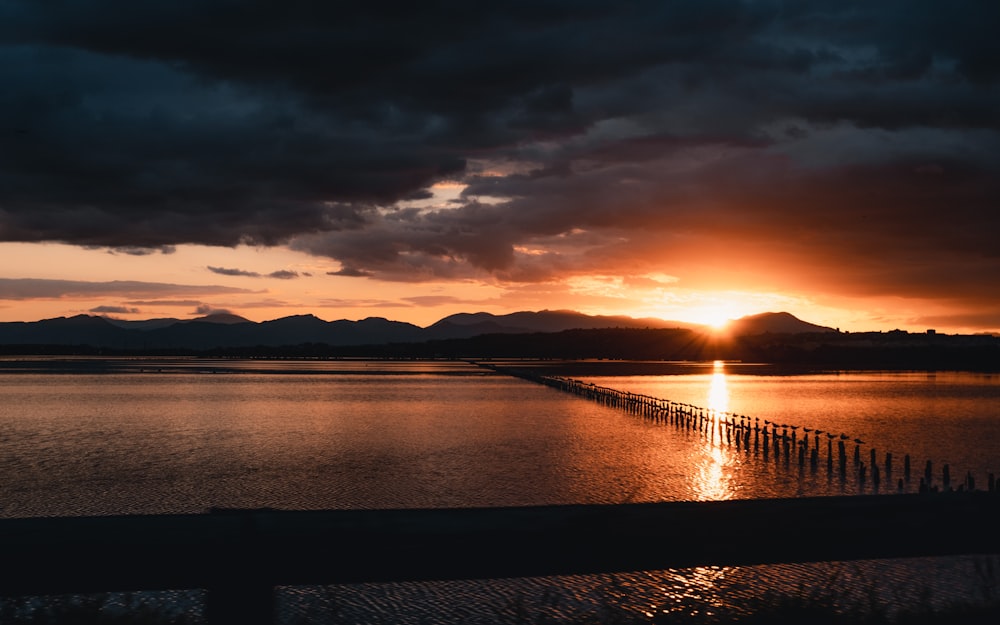 a sunset over a lake