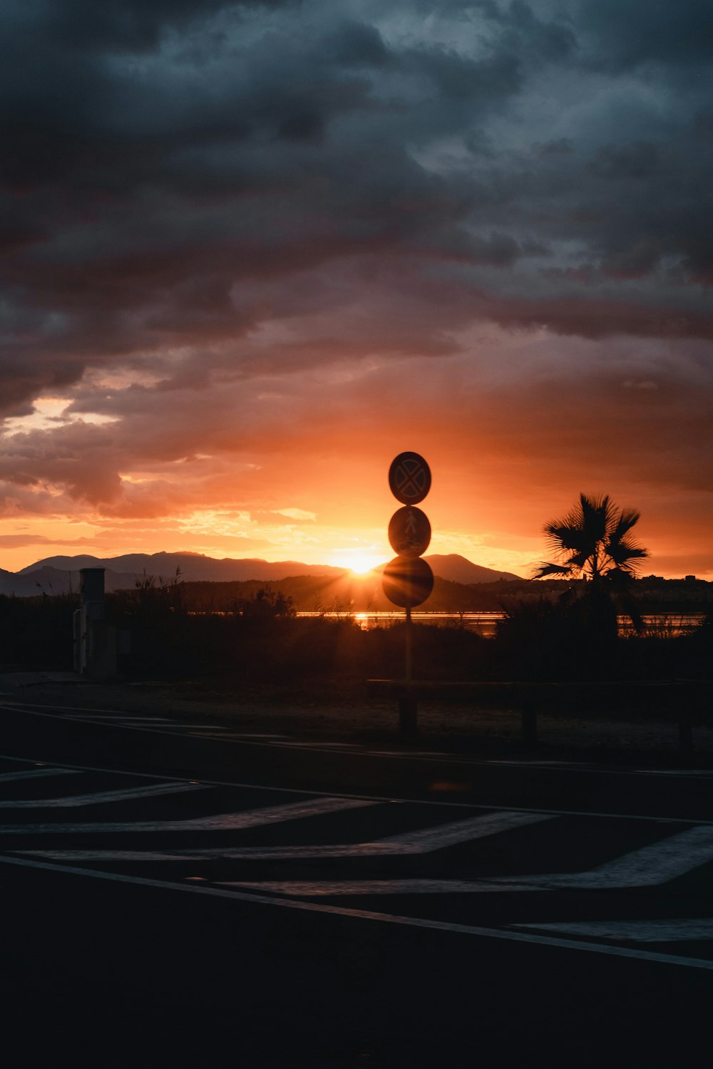 a sunset over a street