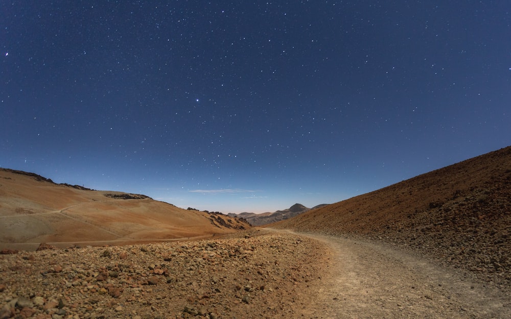 a dirt road in the mountains