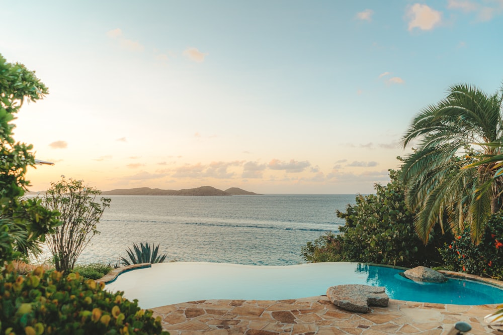 a pool next to a body of water