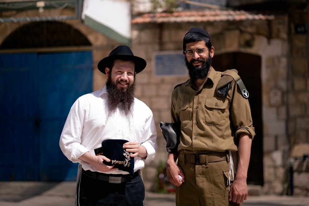 a man with a beard and a man with a hat