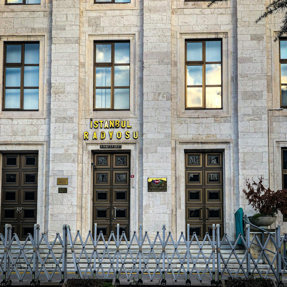 a building with a fence in front of it