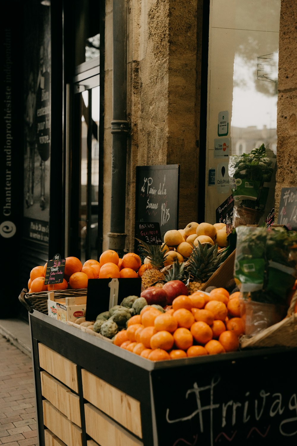 a fruit stand with oranges