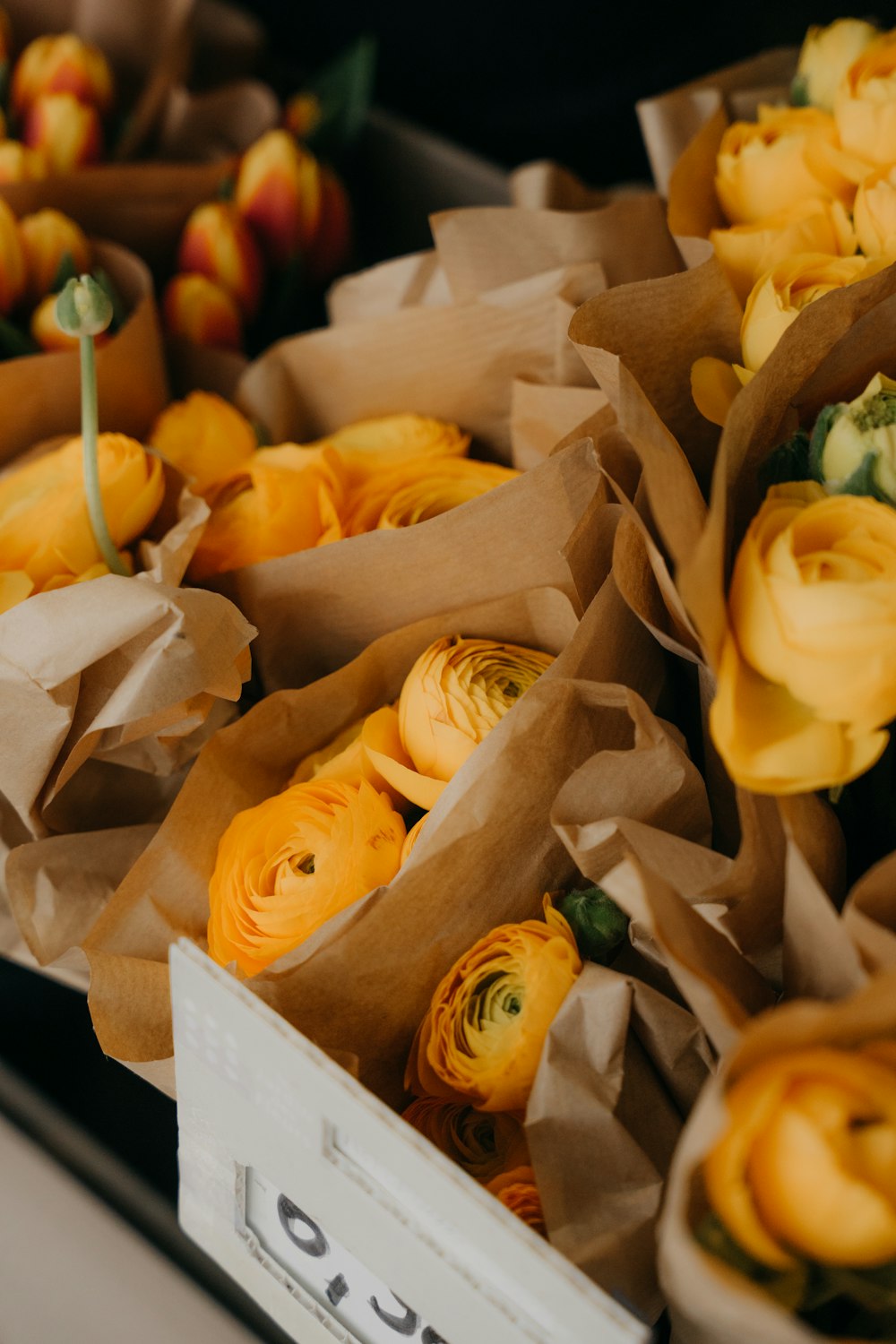 a basket of yellow flowers