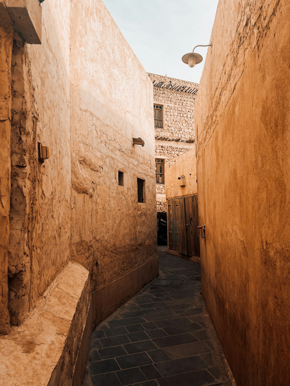 a narrow alley between two buildings