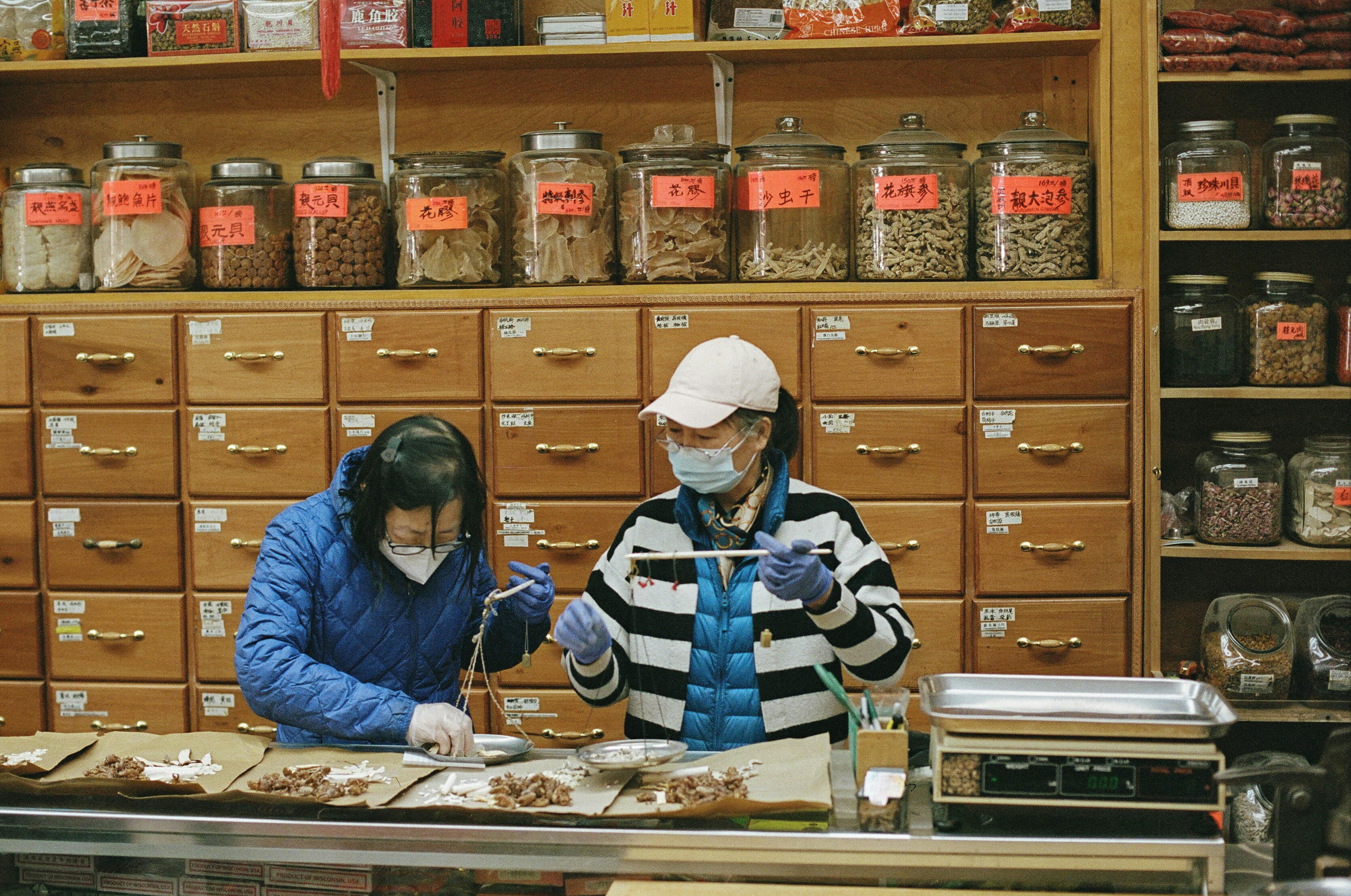 a couple of people working in a laboratory