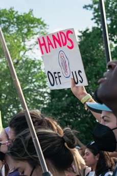 a person holding a sign