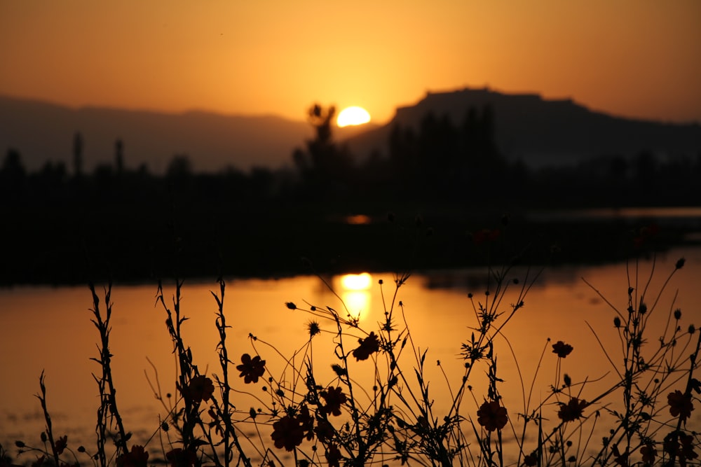 a sunset over a lake