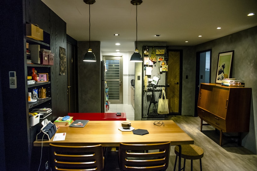 a dining room with a table and chairs