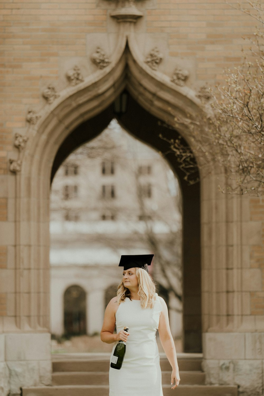 a person in a gown and cap