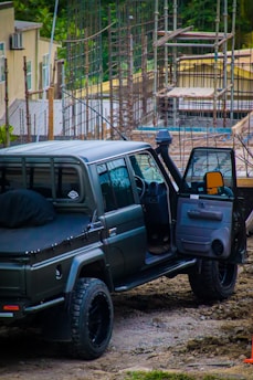 a car parked on a dirt road