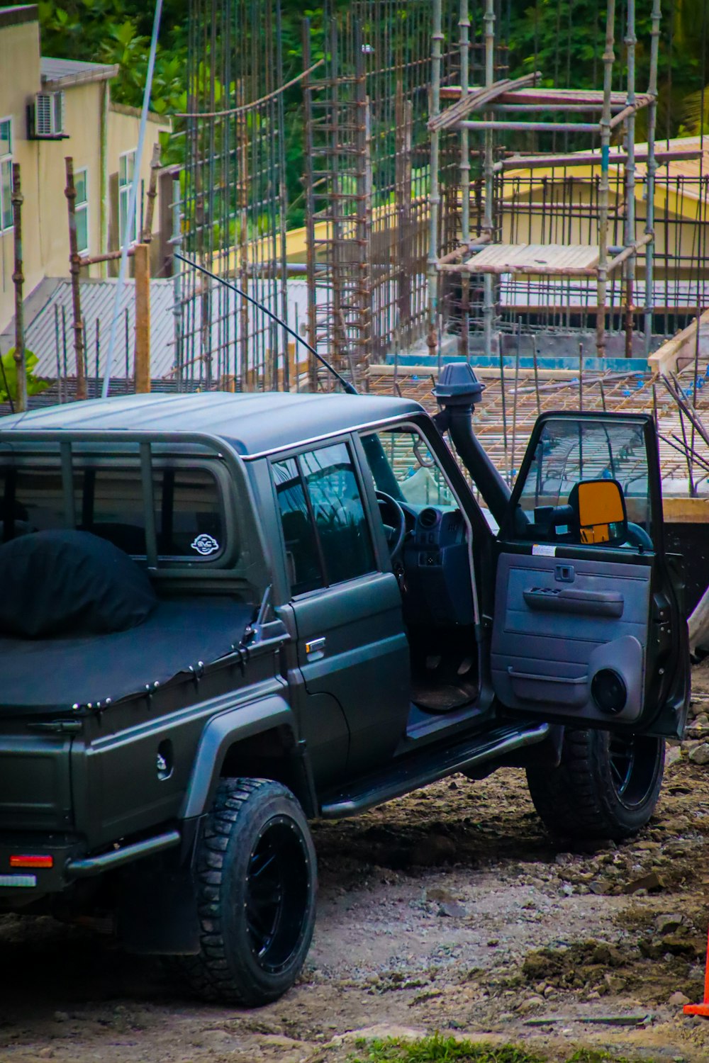 a car parked on a dirt road