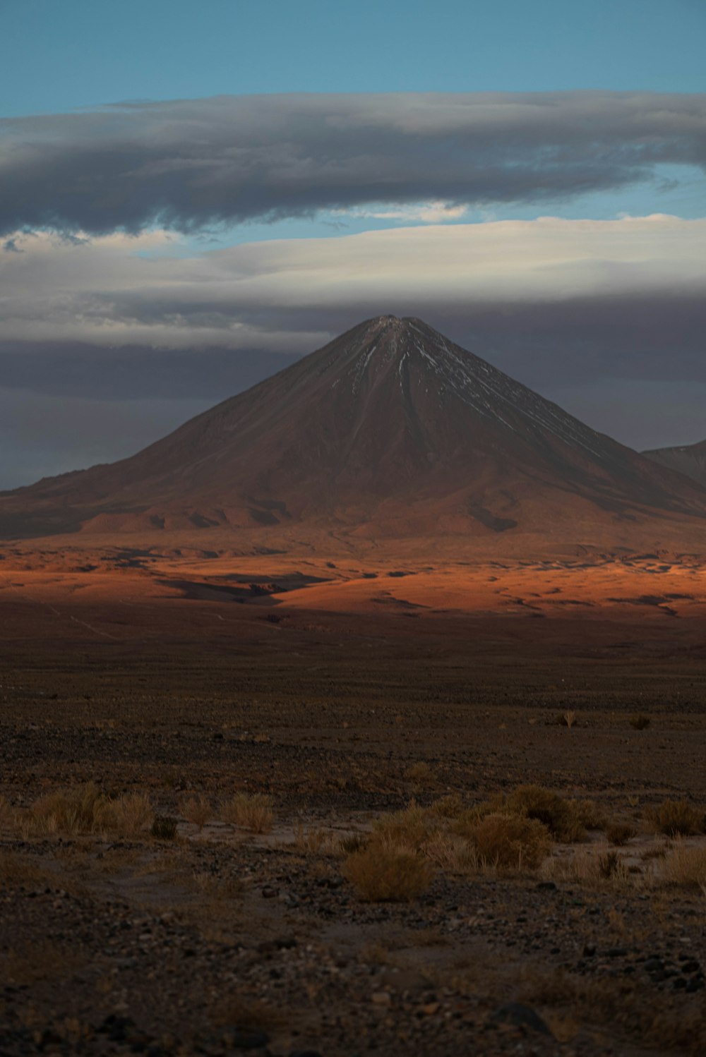 a large mountain in the desert